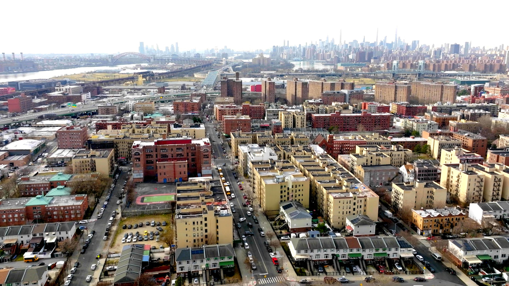 Two children  smiling while sitting at a table