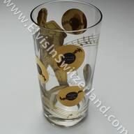 Original 1956 Gold Record Glass (Copyright 1956, Elvis Presley Enterprises). Reproduced and sold as such in the late 80's and early 90's in Memphis in Souvenir Shops (with copyright E.P.E. 1988). This one is the real deal from 1956.