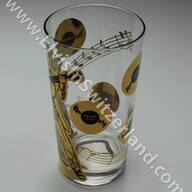 Original 1956 Gold Record Glass (Copyright 1956, Elvis Presley Enterprises). Reproduced and sold as such in the late 80's and early 90's in Memphis in Souvenir Shops (with copyright E.P.E. 1988). This one is the real deal from 1956.