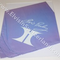 Elvis Las Vegas Hilton lavender concert scarf with a facsimile signature. You could buy them at the souvenir stand in the lobby. Very rarely would Elvis wear these and toss them out to the audience during his Las Vegas performances.