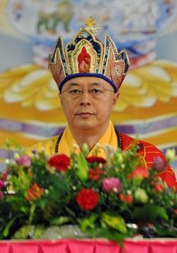 Photograph ofHai Tao in Lotus hat, 2009