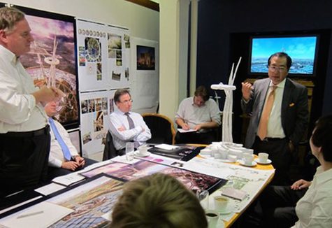 Photograph of Xiao Wunan with Cloud Tower model, 2012