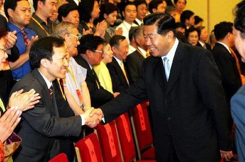 Photograph of Jia Qinglin and CAPDTC delegates, 2010