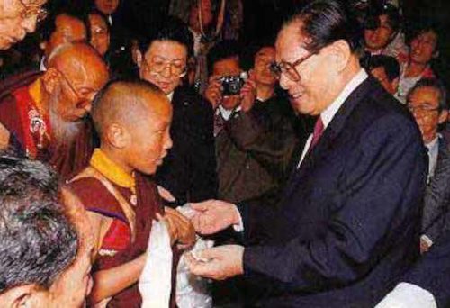 Photo of Karmapa Ogyen Trinley Dorje and Jiang Zemin, 1994