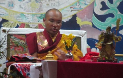 Photograph of Karmapa Ogyen Trinley Dorje performing Guan Gong ritual, 2011