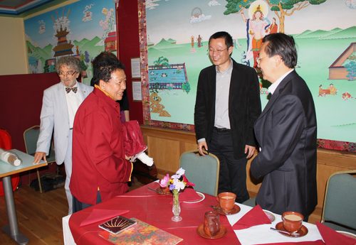 Photograph of Akong Tulku and PRC Deputy Consul General Zhou Youbin in 2011