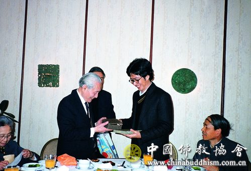 Photograph of Zhao Puchu, He Huizhong, and Ren Wuzhi, 1988