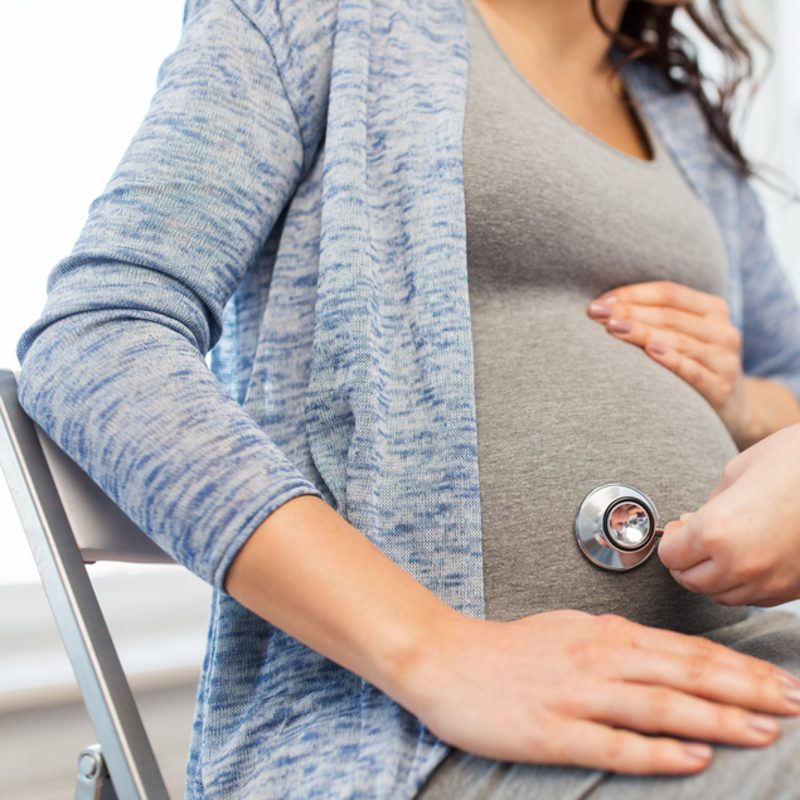 pregnant woman getting examined