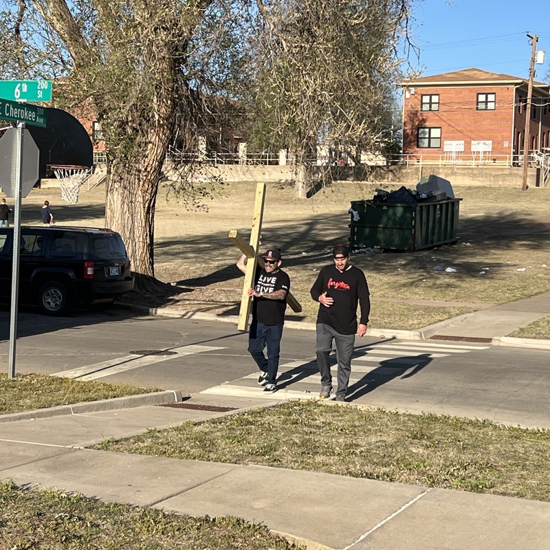 Oasis Cross Carrying