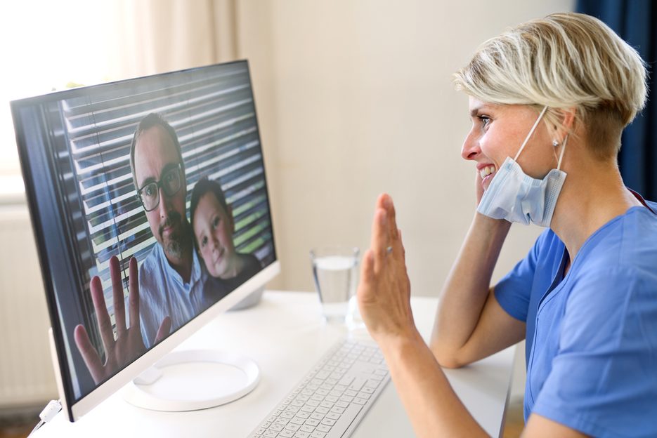nurse talking to people via telehealth